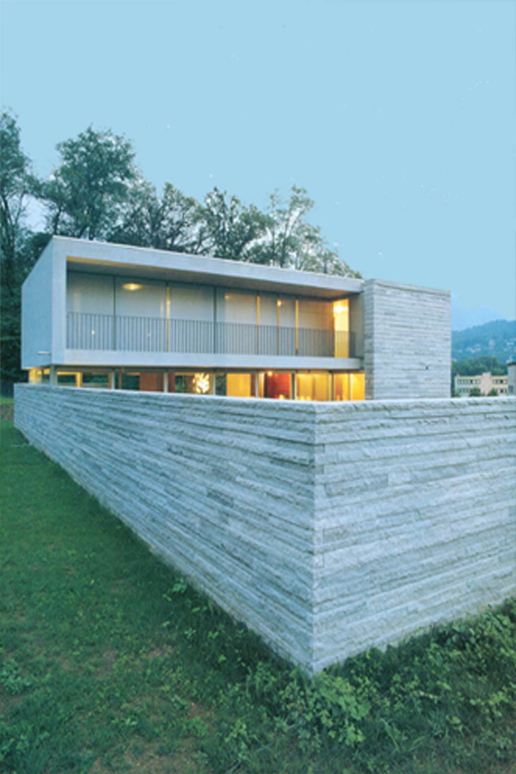 Villa con architettura moderna in pietra a Manno lavori privati Studio di architettura Forni & Gueli